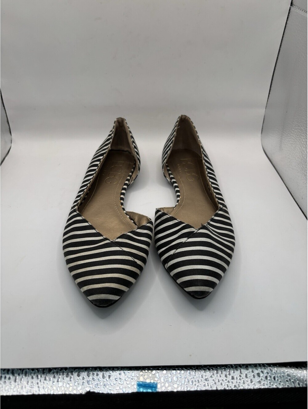 BCBG Paris Women's Black and White Striped Pointed Toe Flats